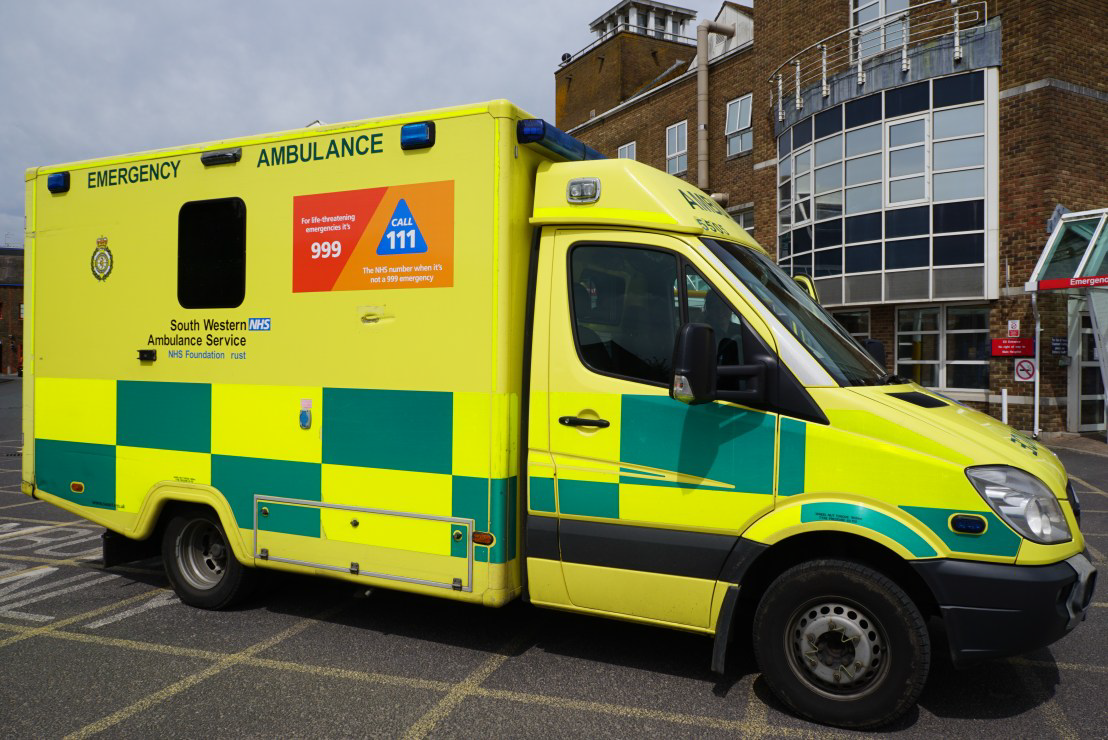 An ambulance parked outside an Emergency Department.