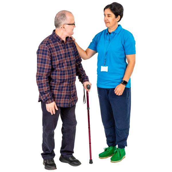 A person in a blue uniform with a name badge assists another person using a cane. They are engaged in a conversation.
