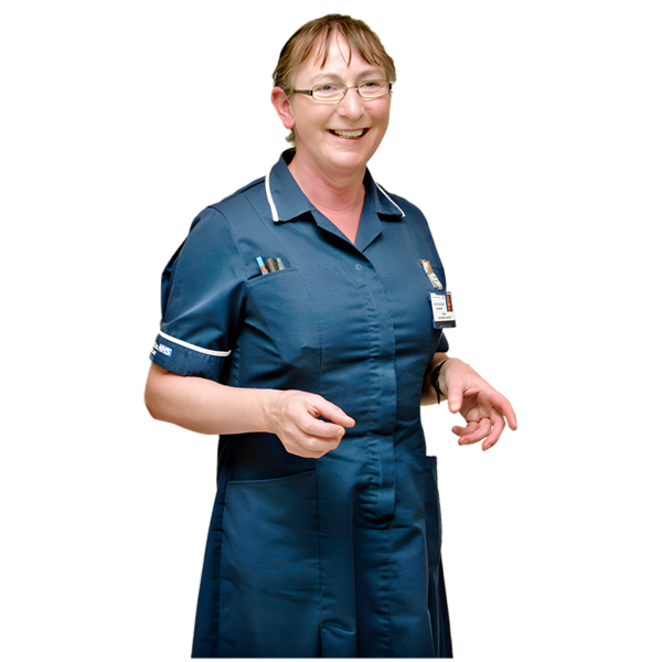 A nurse in a blue tunic smiling at the camera.