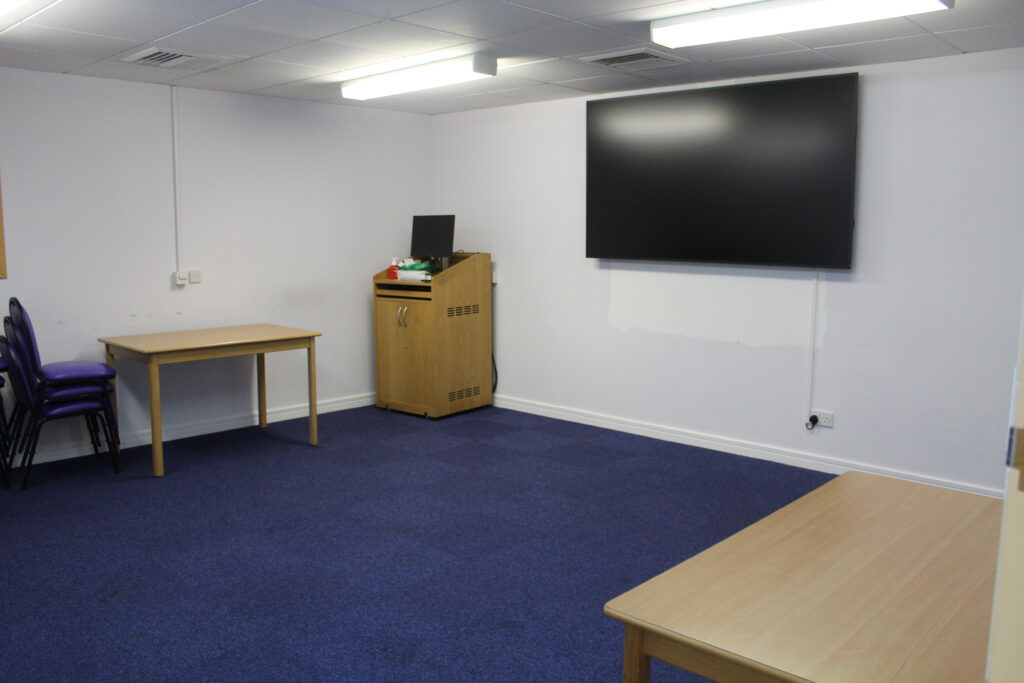 An empty training room in an education setting.