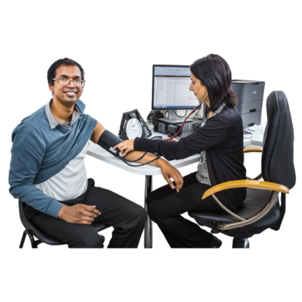 An individual sitting in a chair having their blood pressure checked.