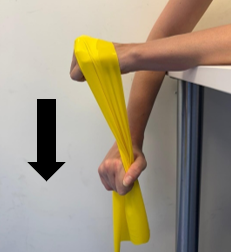 A person demonstrating wrist strengthening exercises with a band.