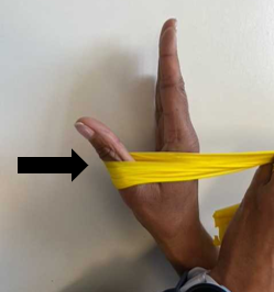 A person demonstrating wrist strengthening exercises with a band.