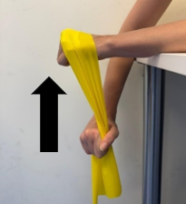 A person demonstrating wrist strengthening exercises with a band.