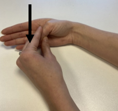 A pair of hands demonstrating thumb stretches.